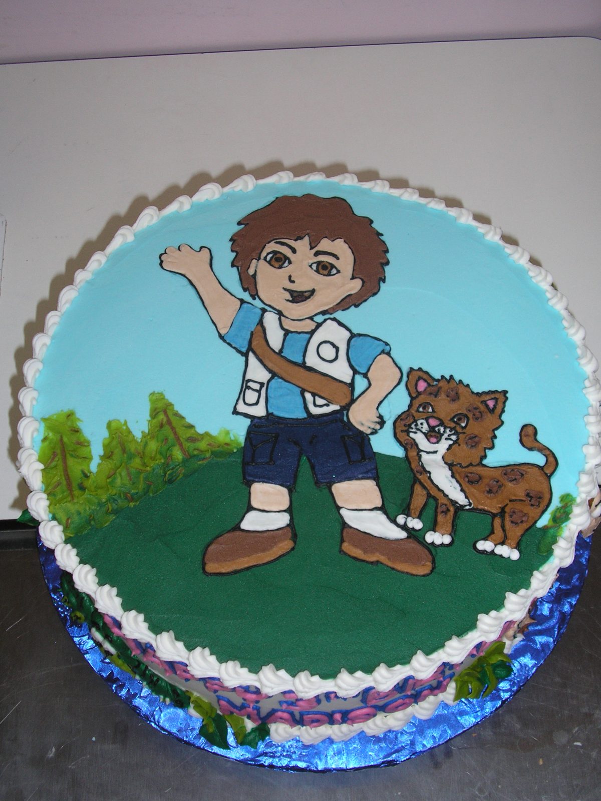 icing drawing of diego on cake