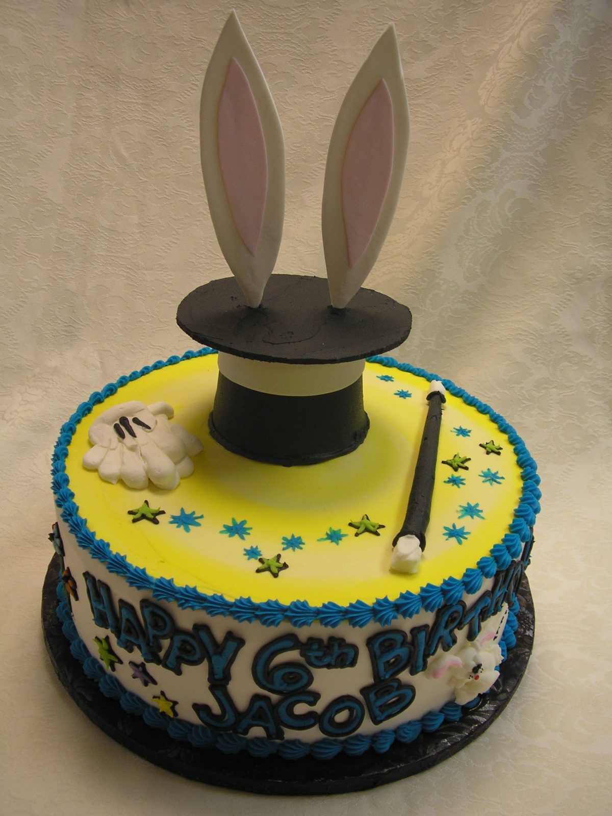 3 D magician cake. rabbit out of the hat cake